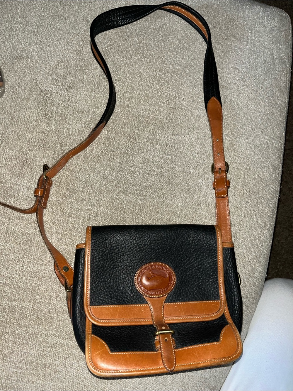 Dooney & Bourke Black with Tan Leather Trim Pebbled Crossbody Bag